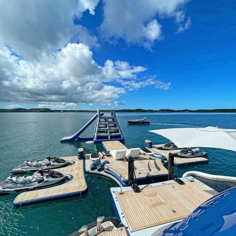 Inflatable platforms on the stern of a superyacht in a remote location