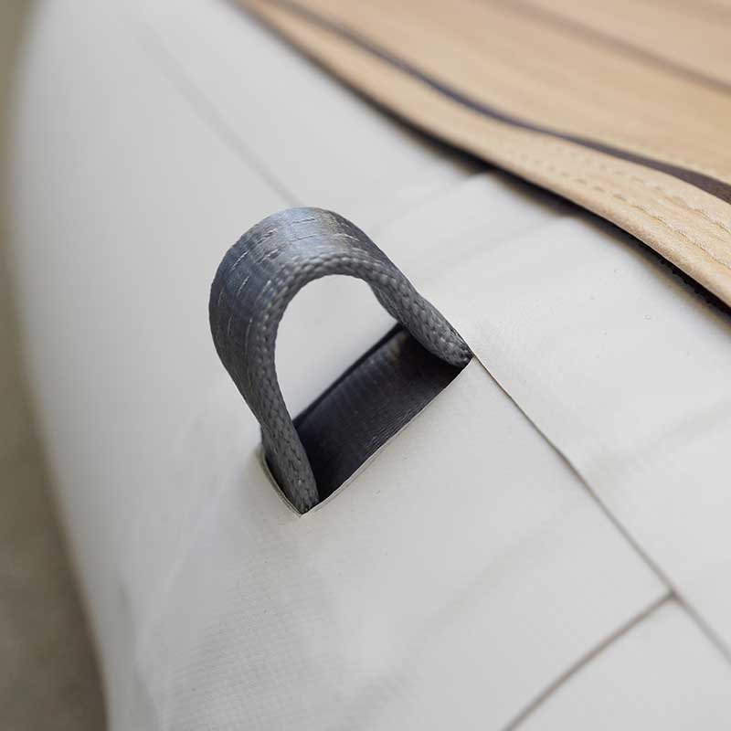 Platforms An inflatable Inflatable Platforms and Docks is sitting on a wooden platform in a garage.