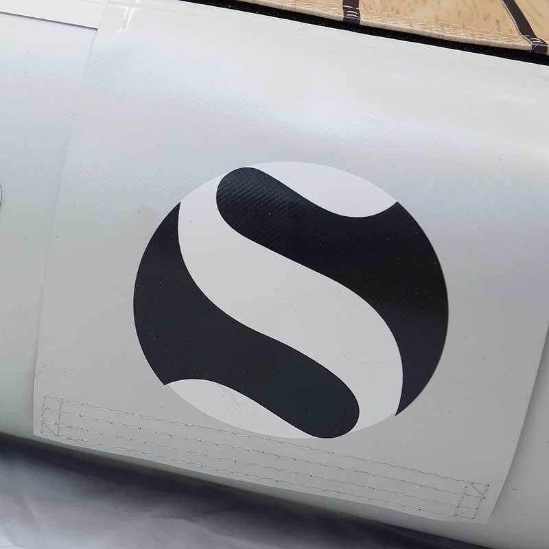 Platforms An Yacht Slide with a ladder on it, perfect for energetic inflatable games.