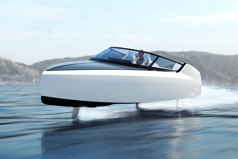 A rigid inflatable boat driving past a superyacht