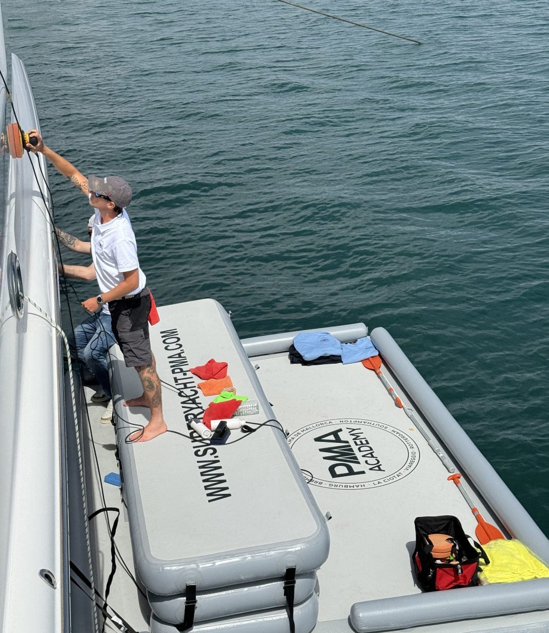 Inflatable platforms with water toys on attached to the stern of a large yacht