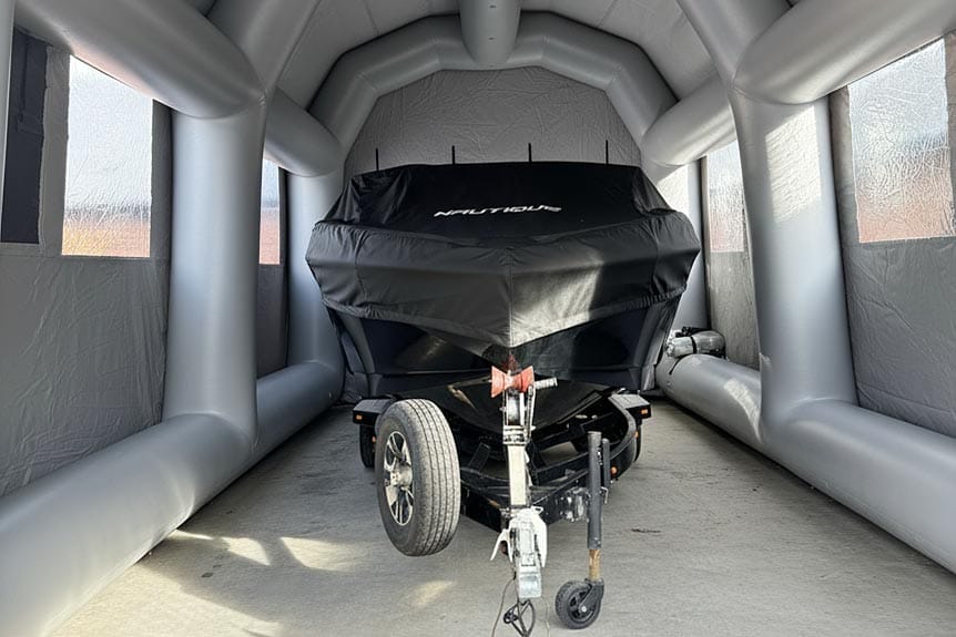 Inflatable platforms with water toys on attached to the stern of a large yacht